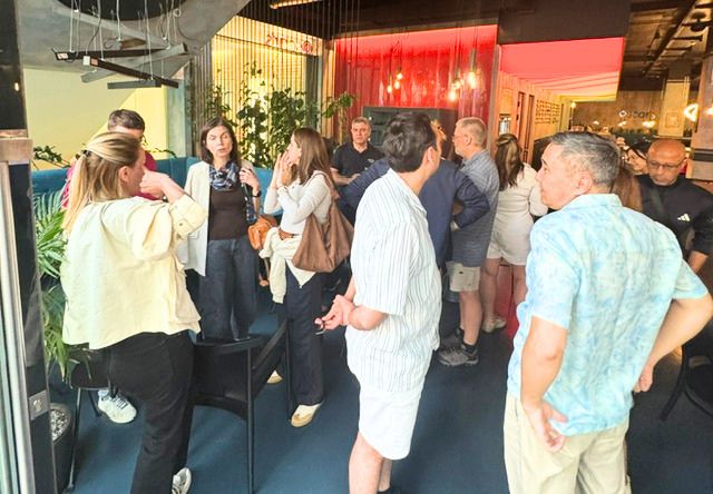 Group shot of partners socialising at Partner meeting