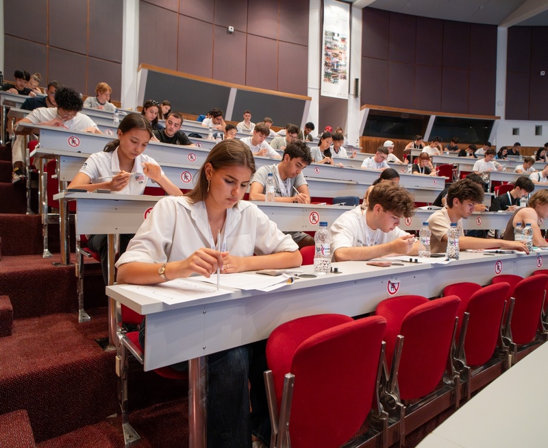 Students in Economics Olympiad exam
